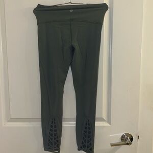 Gorgeous olive green leggings , never worn before .